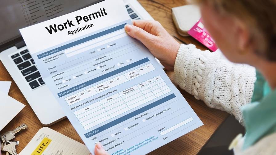 Is it legal to work if the work permit is cancelled